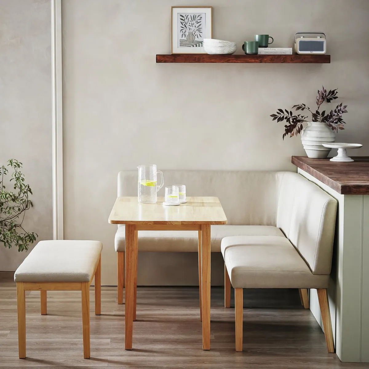 Small dining table with a corner seat and bench