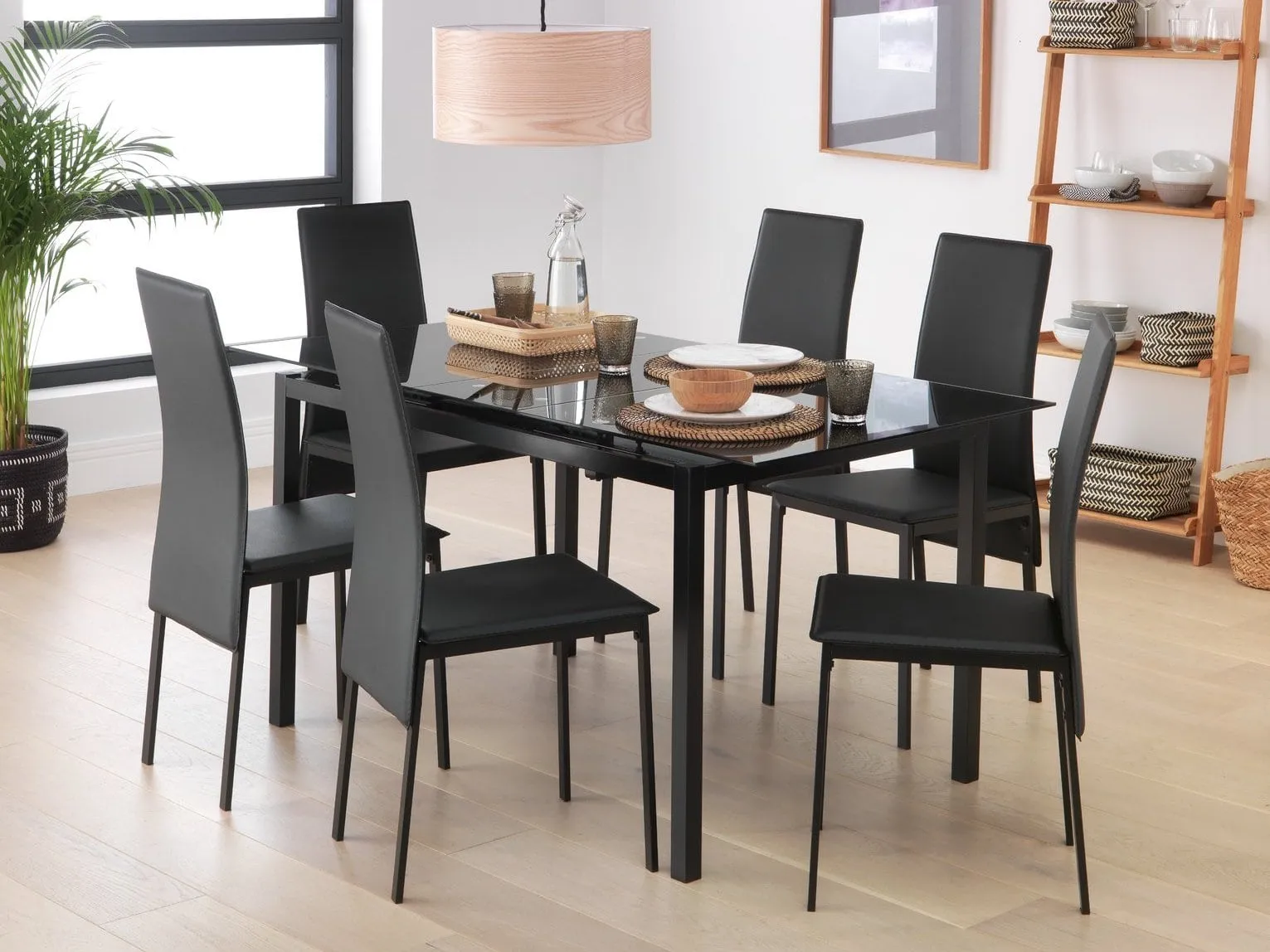 Gloss black dining table and 6 black chairs