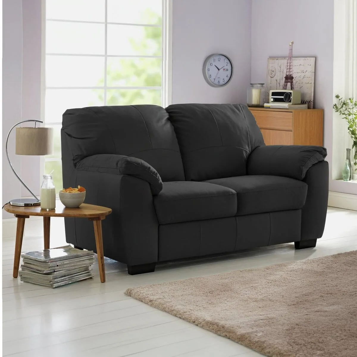Black leather upholstered 2-seater sofa