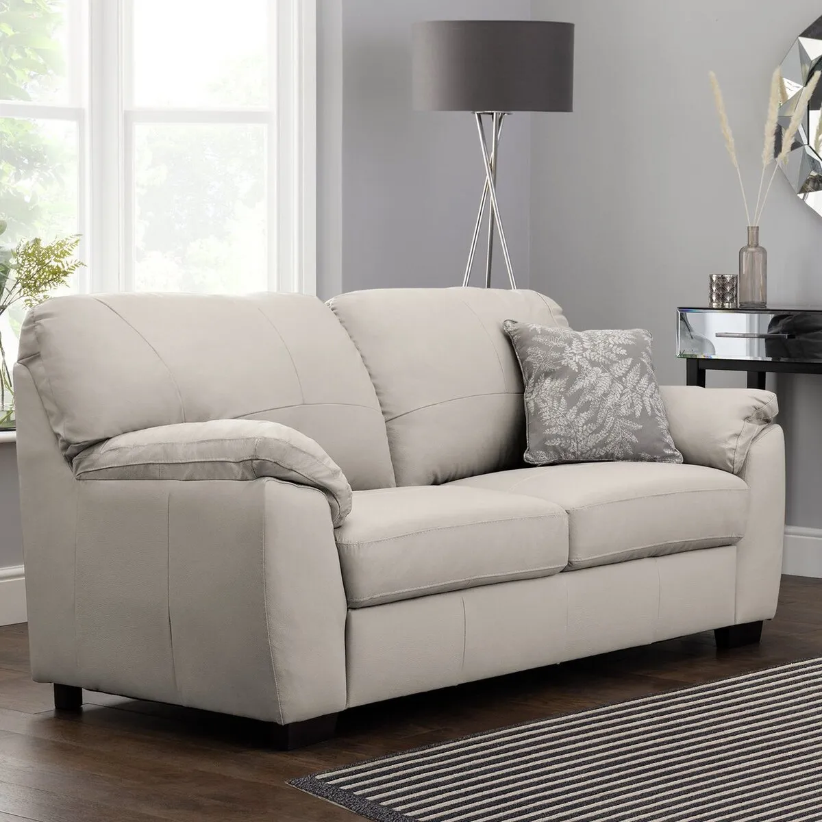 Grey leather upholstered sofa