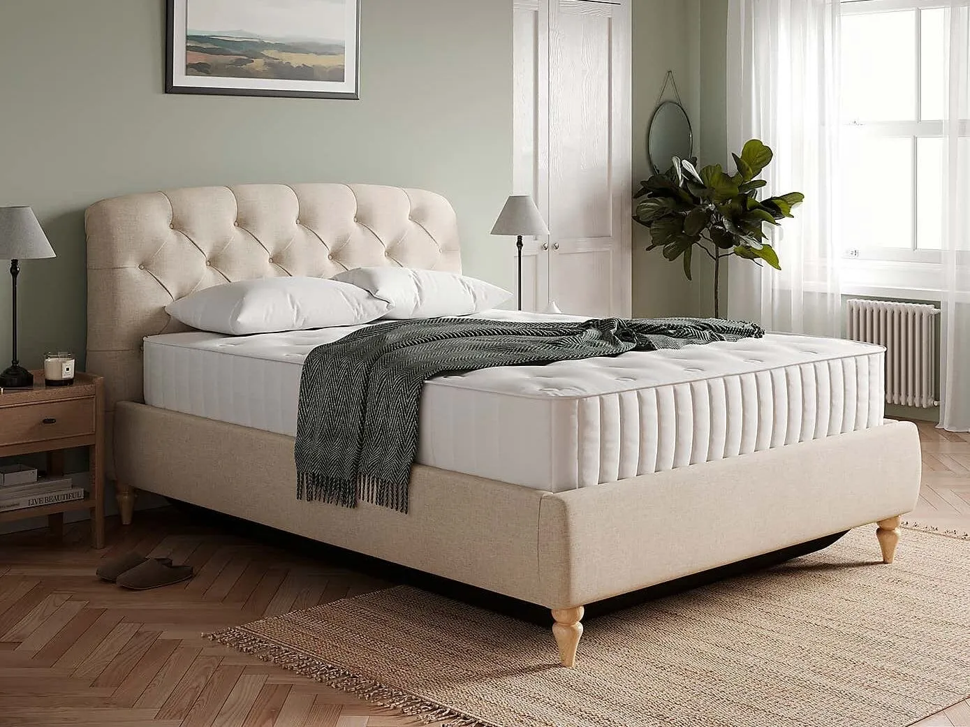 Fabric ottoman bed with buttoned headboard