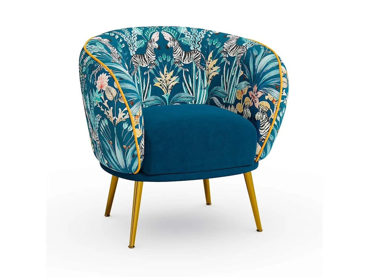 Floral pattern tub chair with gold tapered legs