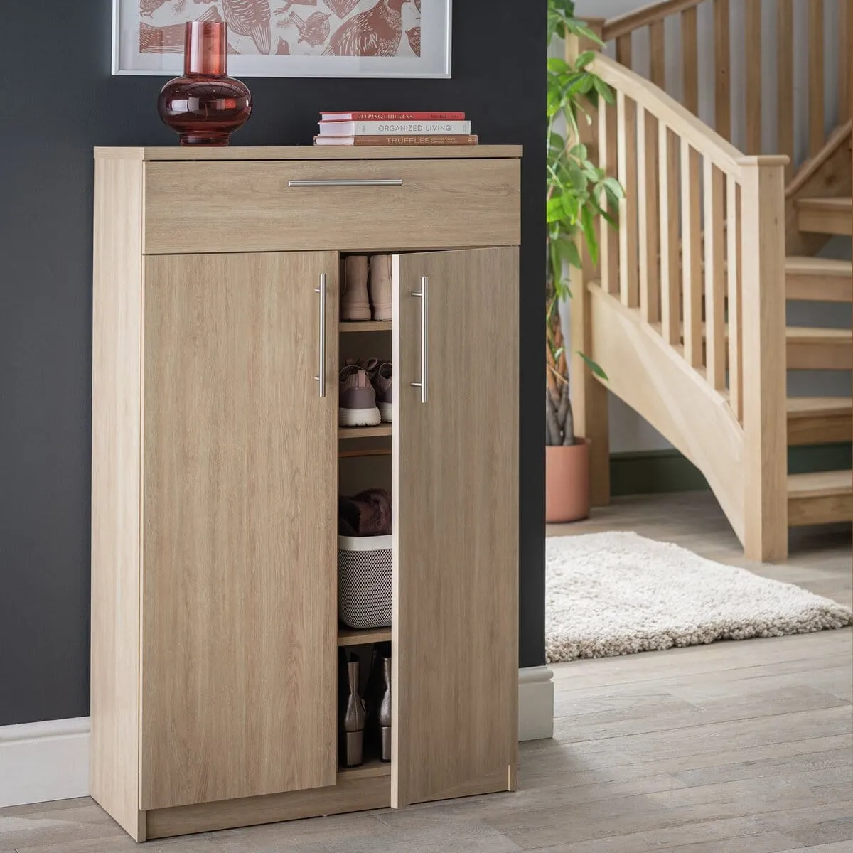 Oak finish shoe cabinet with drawer