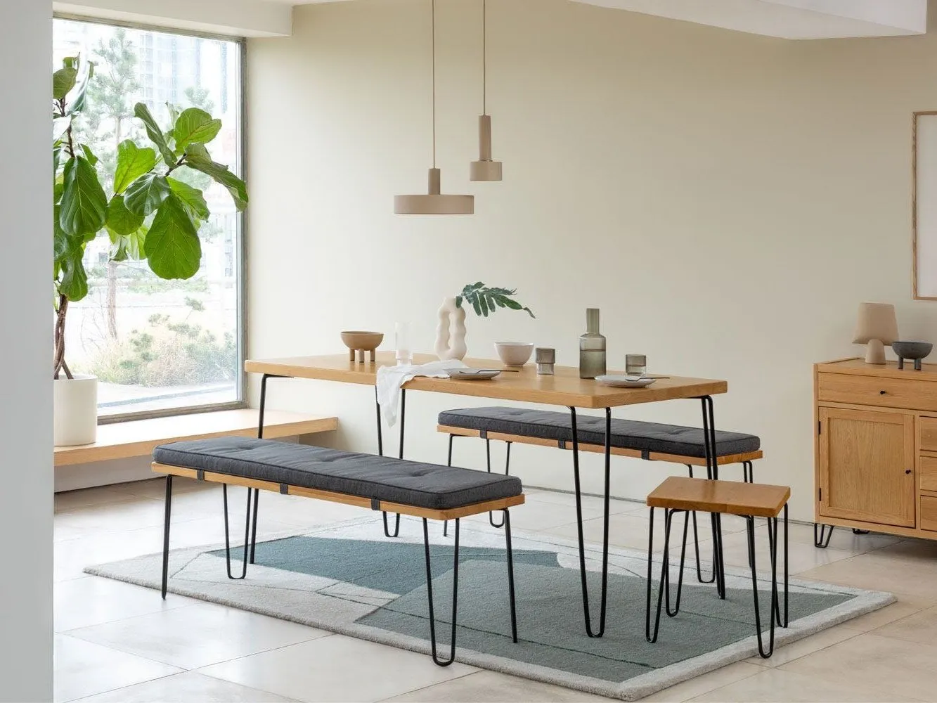 Oak dining table with black hairpin legs