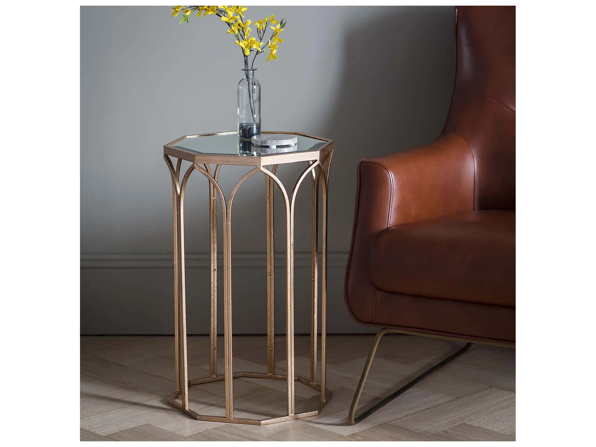 Octagonal side table with glass top and gold frame