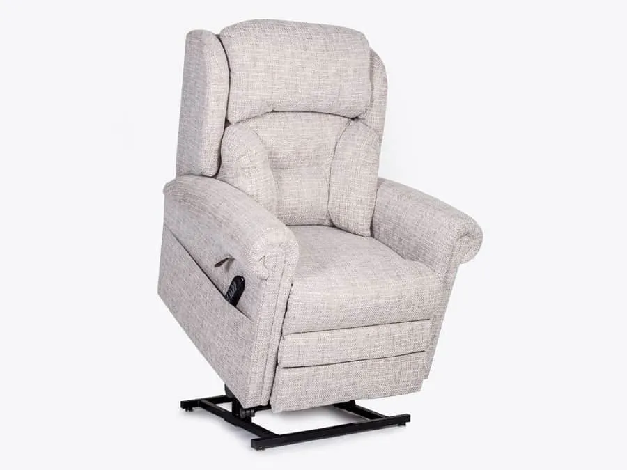 Beige fabric chair with leg rest raised