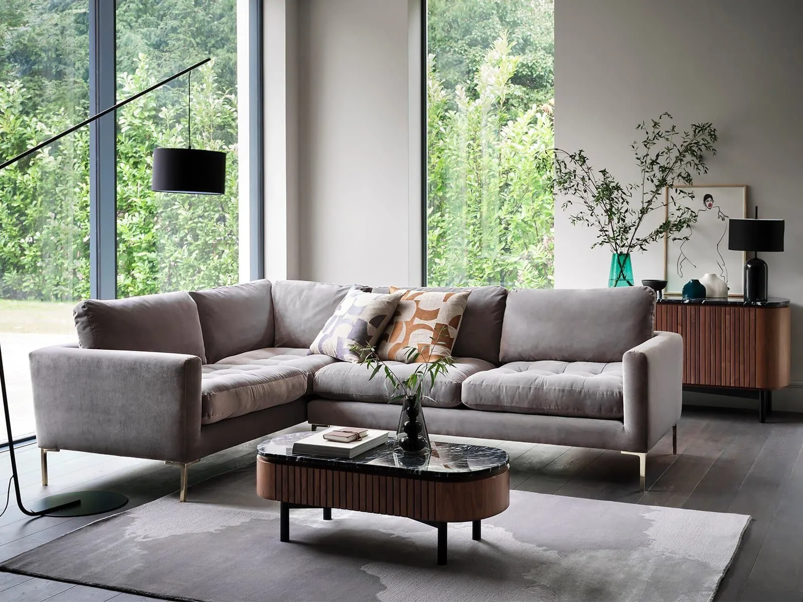 Grey fabric upholstered corner sofa