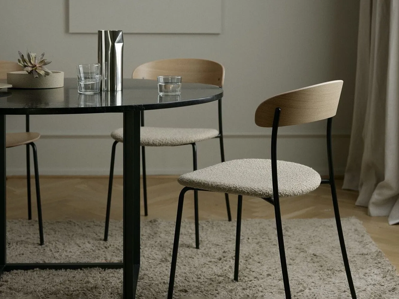 Round black dining table