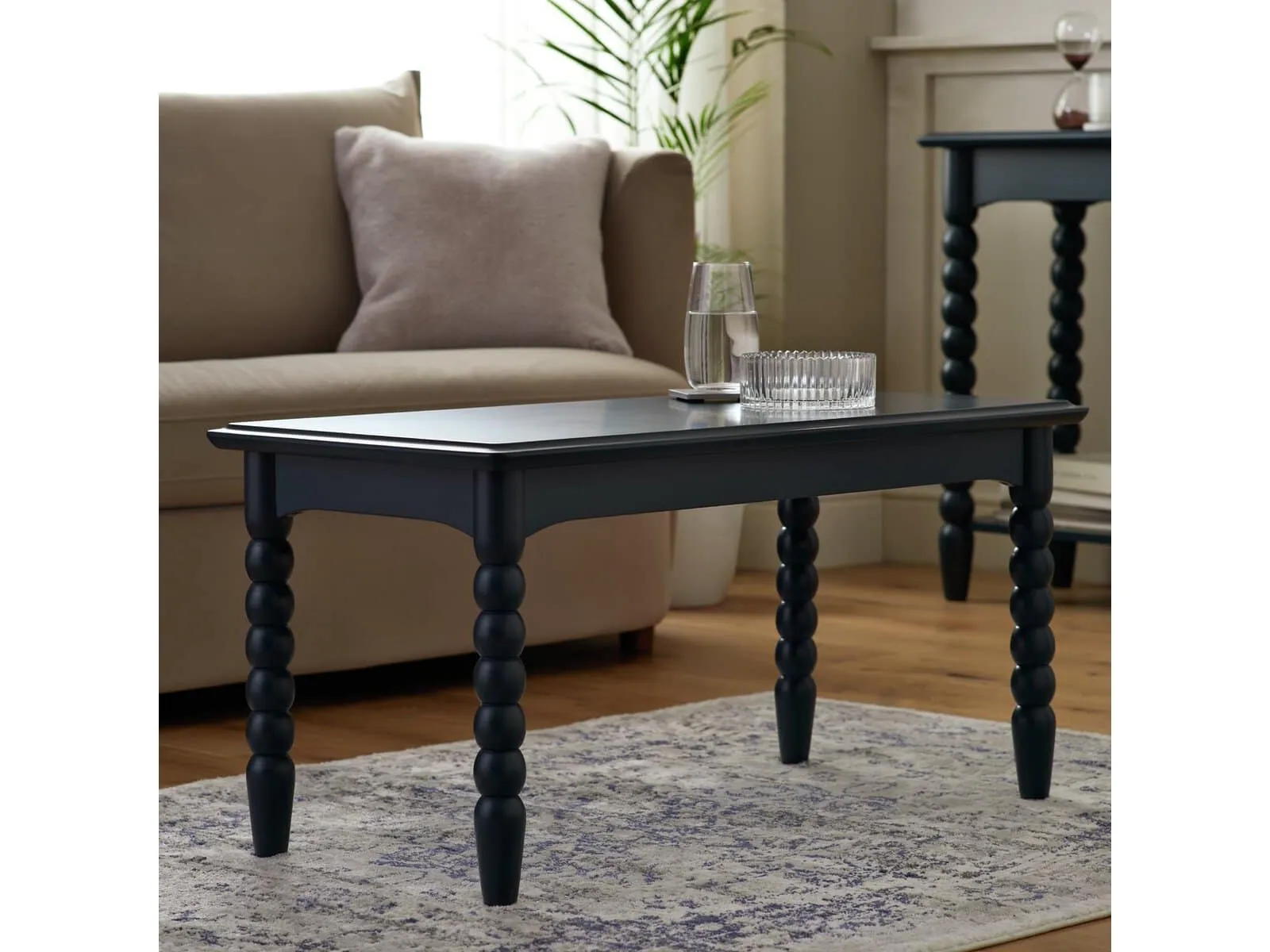 Navy blue coffee table with bobbin-style legs