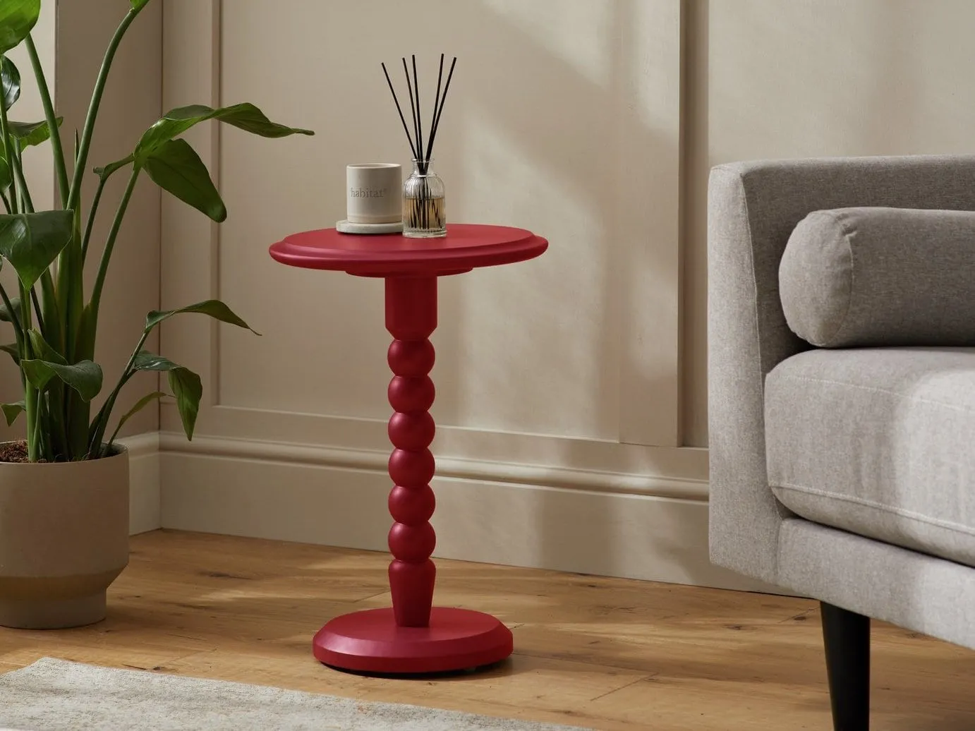 Red side table with boobin stand