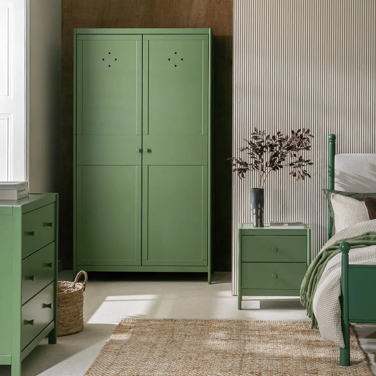 Green-painted bedroom furniture