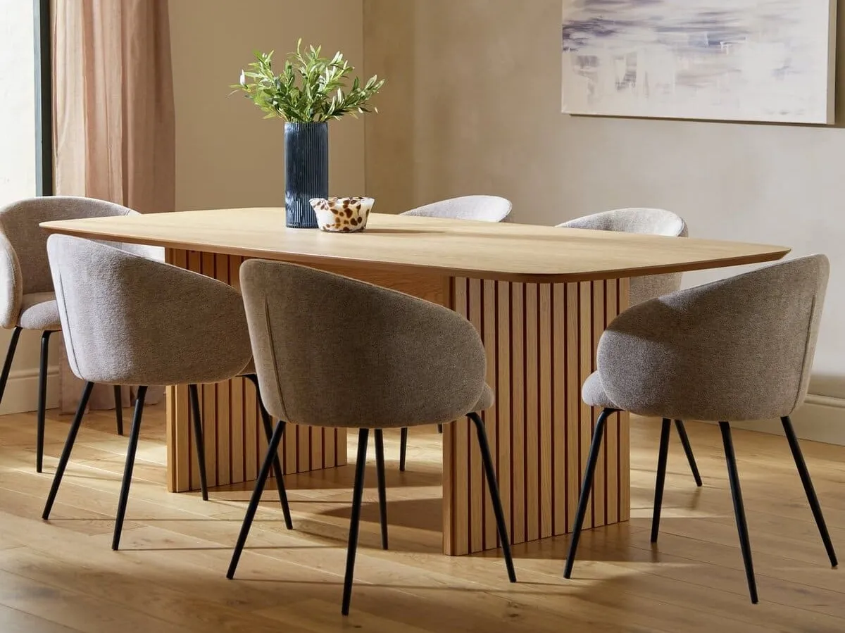 Oak dining table and 6 curved grey fabric chairs