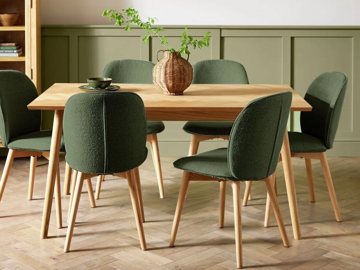 Oak dining table and 6 green fabric dining chairs