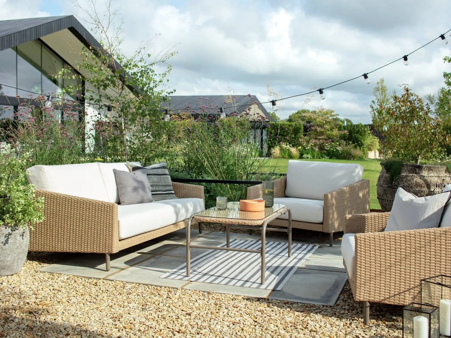 Rattan sofa and 2 matching armchairs