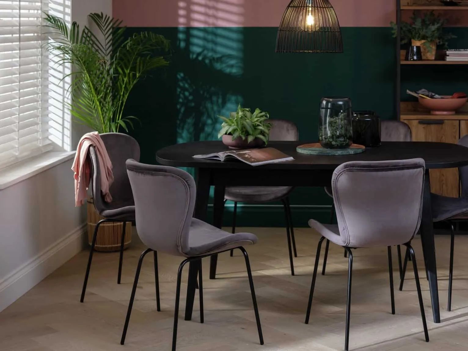 Black dining table and 6 grey chairs