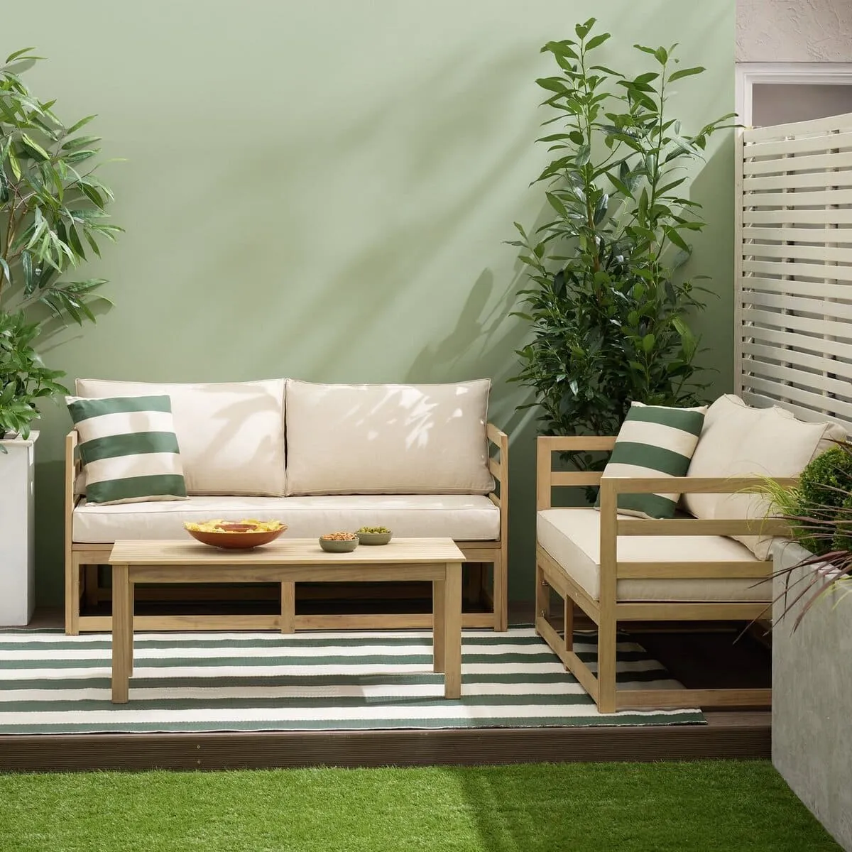 Outdoor corner sofa set with wooden frames and cream cushions with a matching coffee table