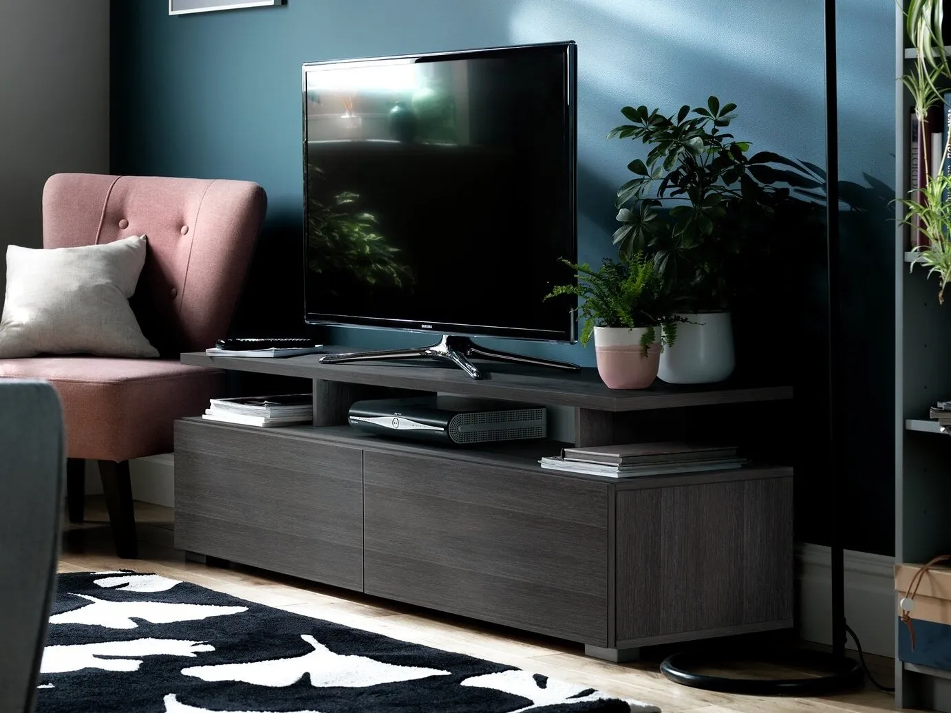 Dark brown woodgrain tv unit with black trim