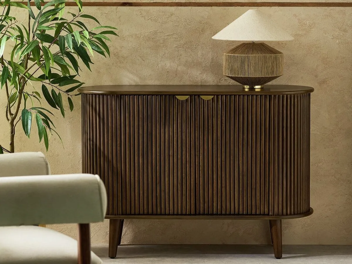 Walnut sideboard with fluted surface finish