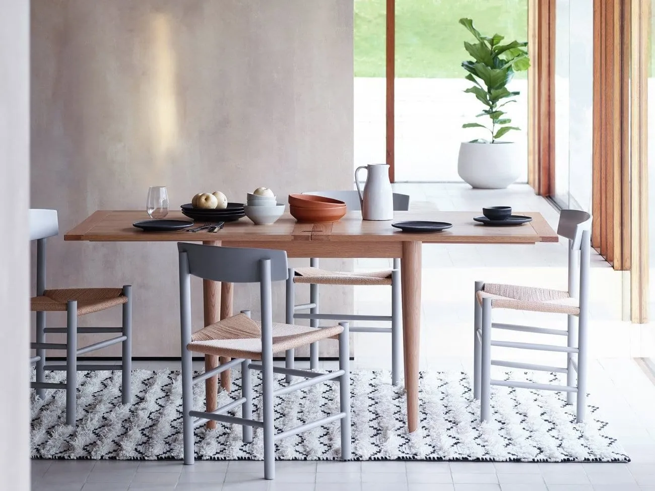 Extending dining table and 4 chairs
