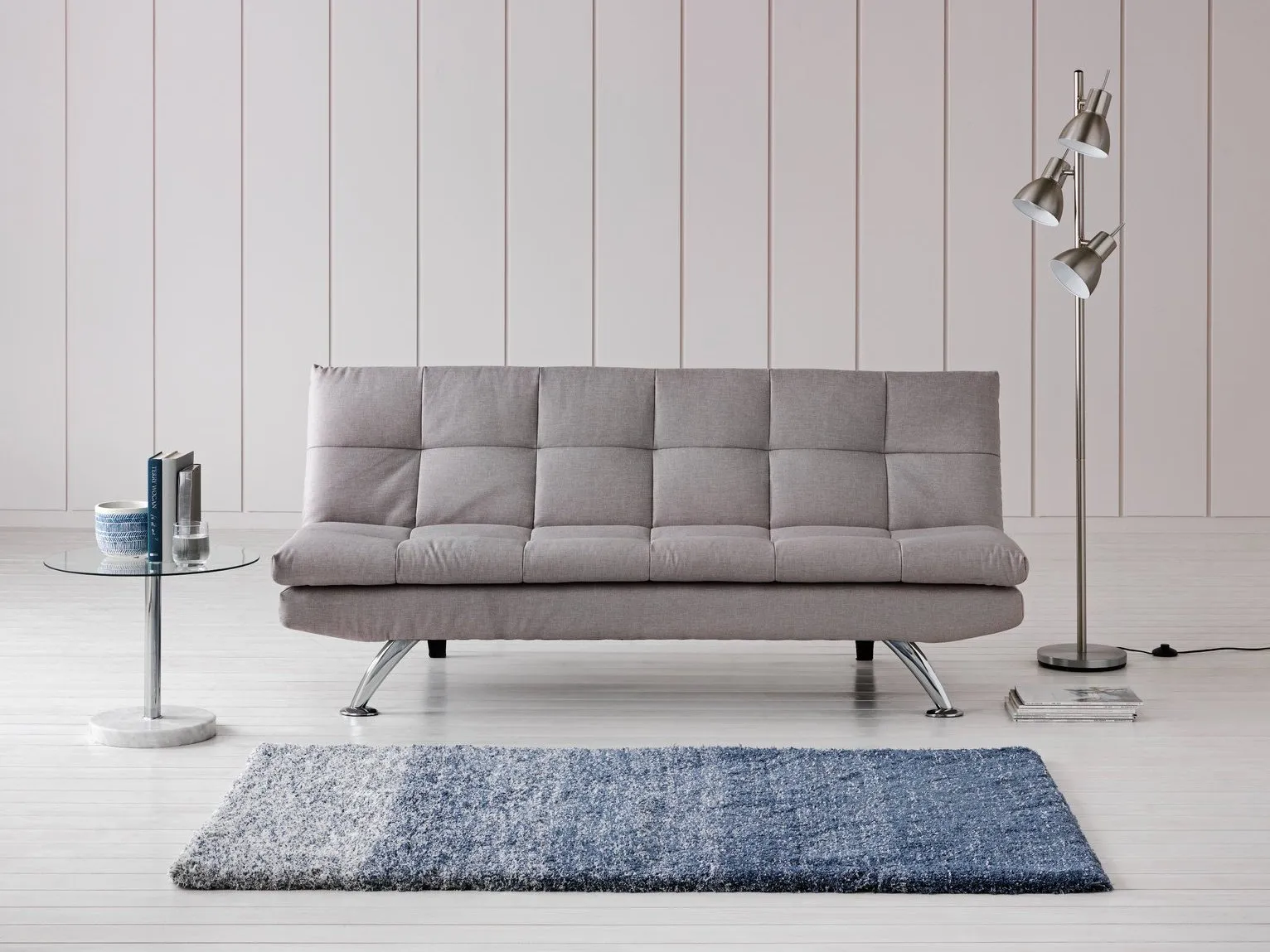 Fabric sofa bed with metal legs
