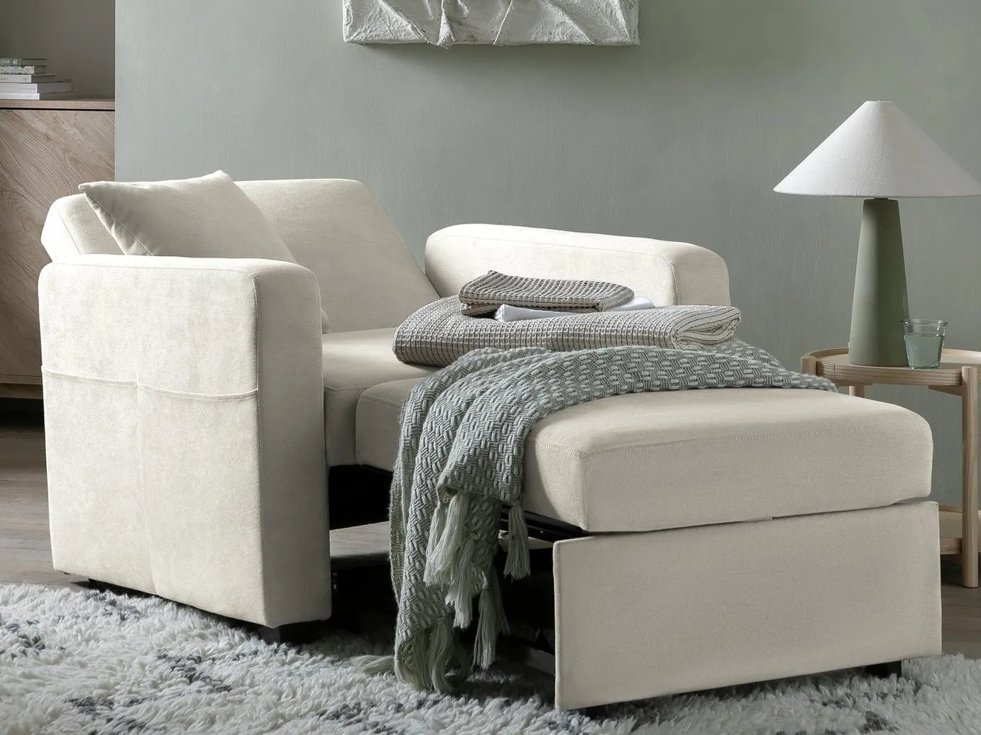 Light-grey fabric chair bed