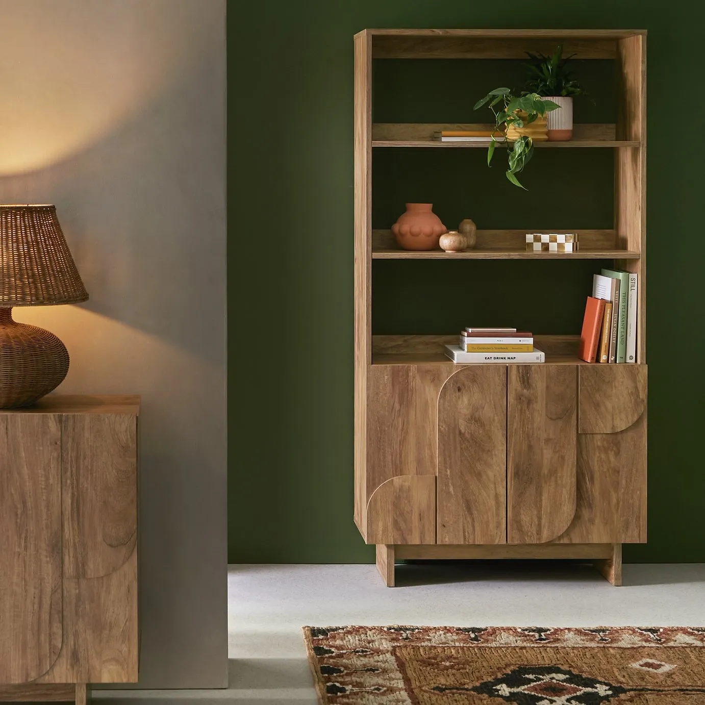 Tall oak bookcase with 2 cupboard doors and 3 open shelves