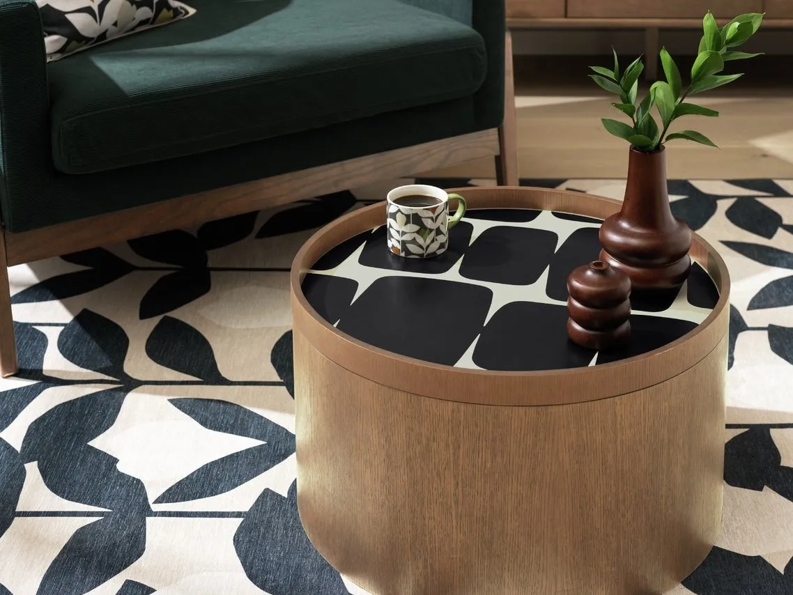 Circular coffee table with walnut finish