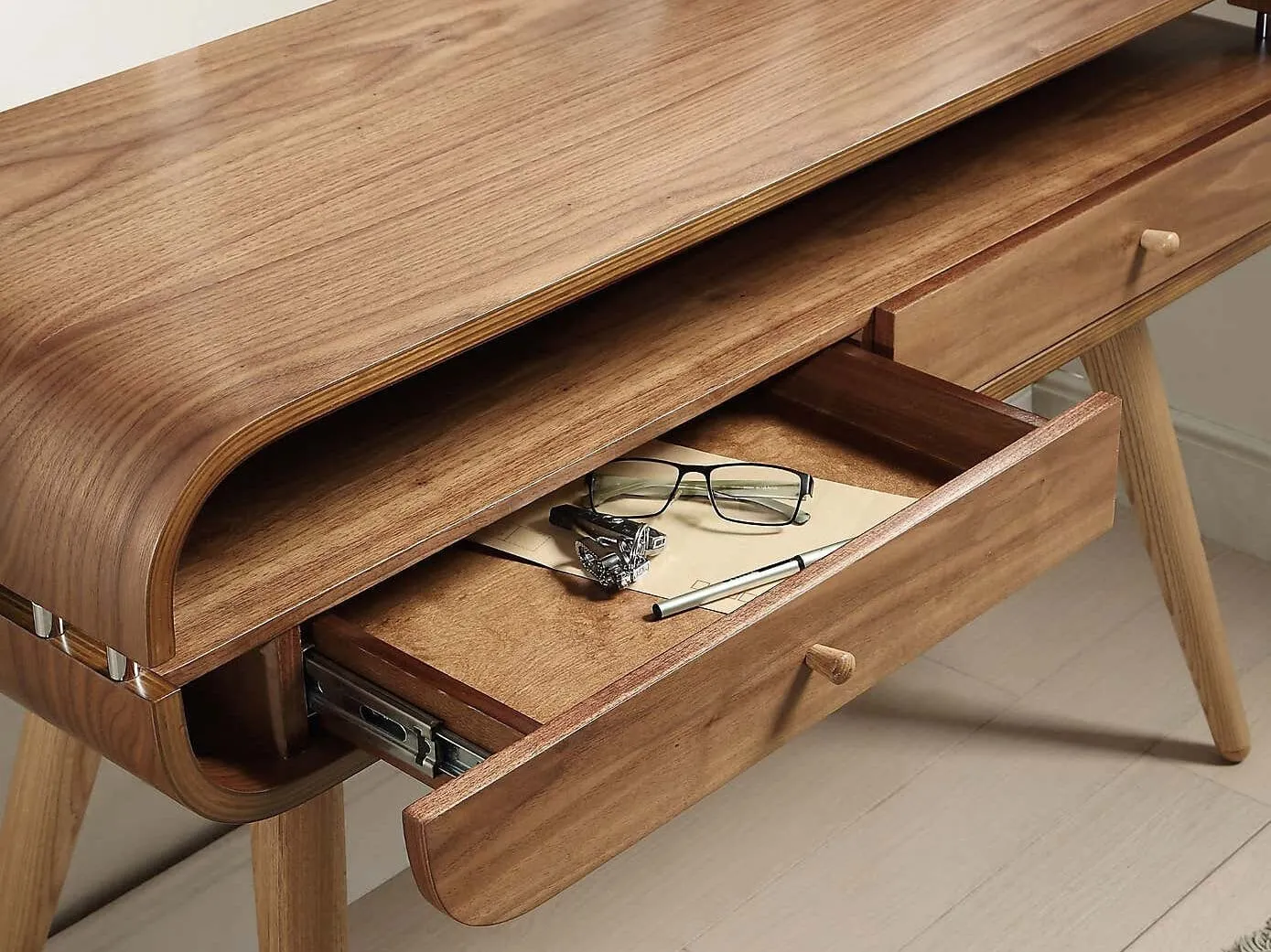 Curved dark wood tv stand