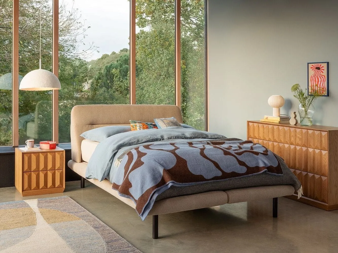 Fabric upholstere bed frame with round wooden legs