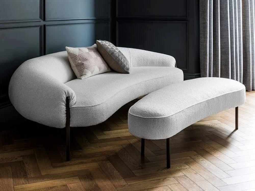 Grey fabric curved sofa and matching ottoman