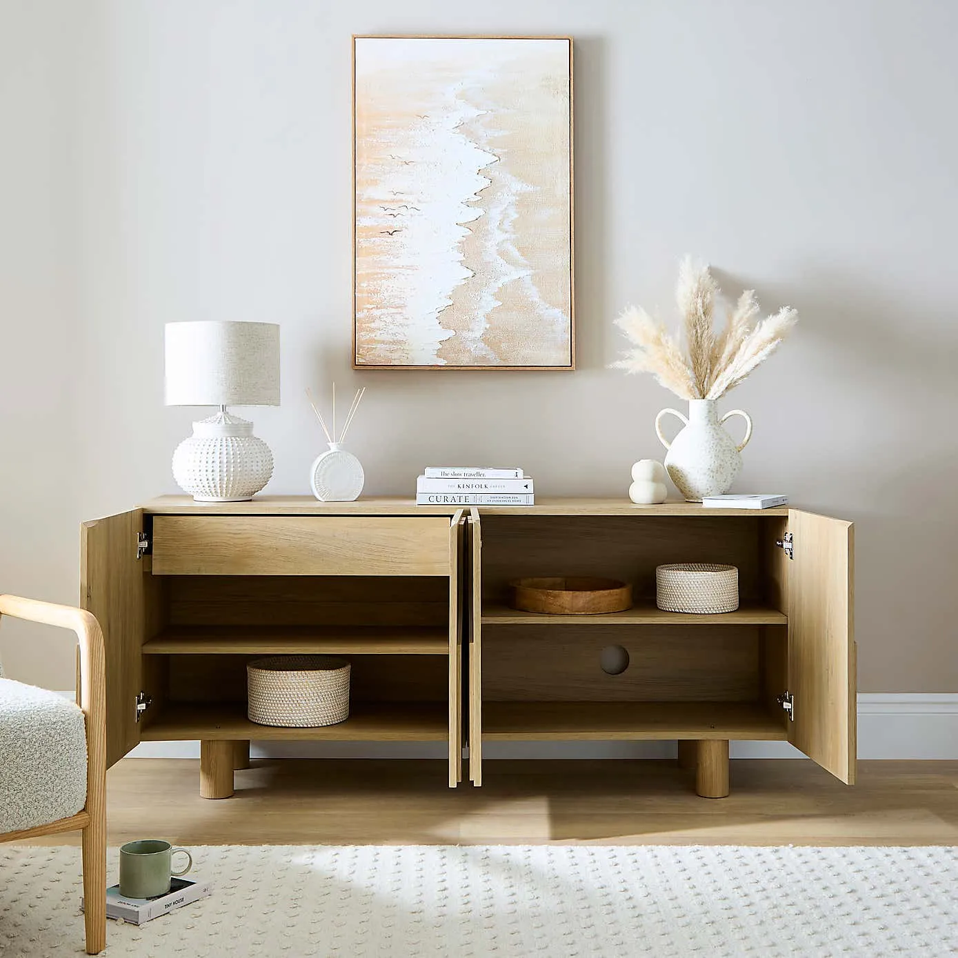 light-oak sideboard with sculpted pattern doors