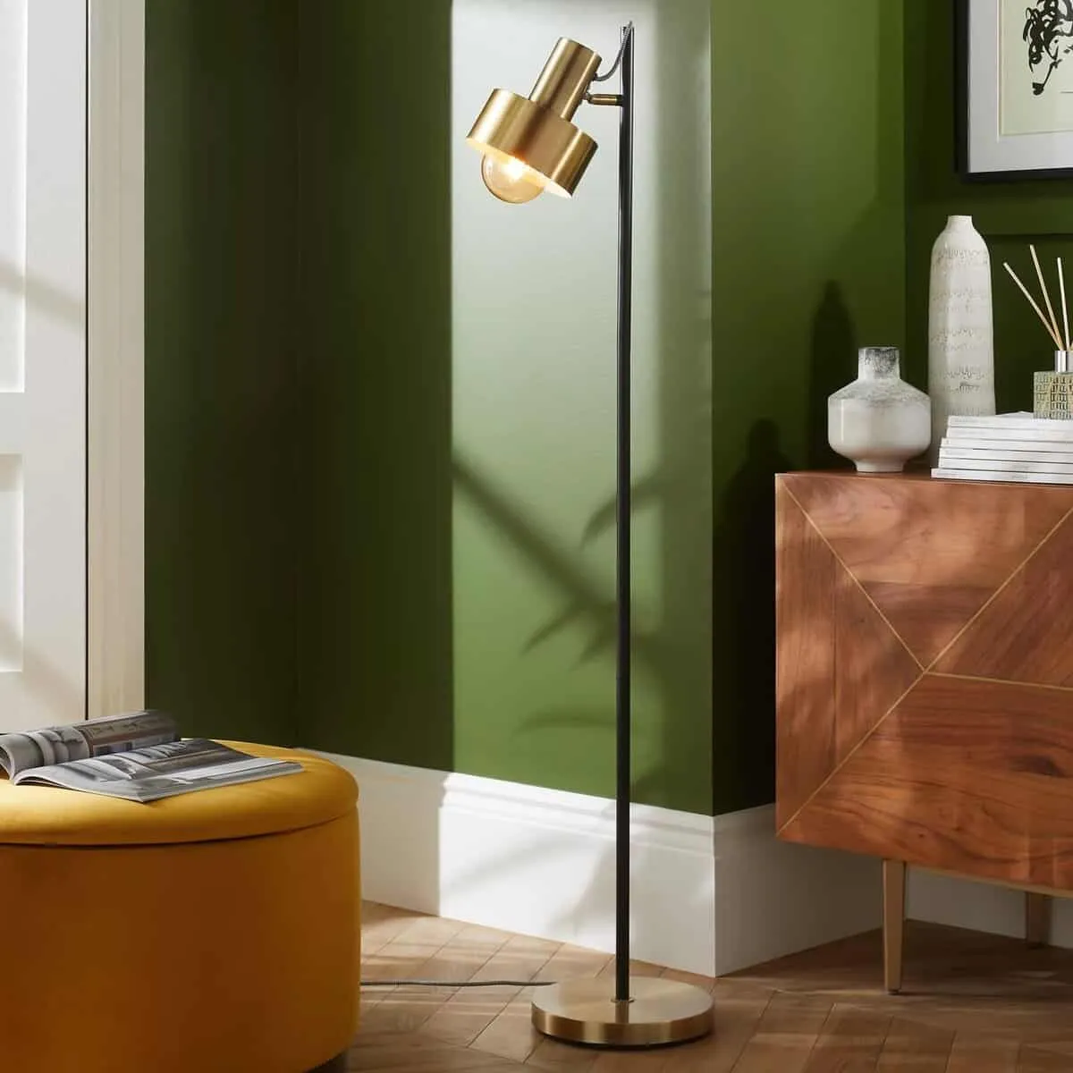 Brass floor lamp with large single head
