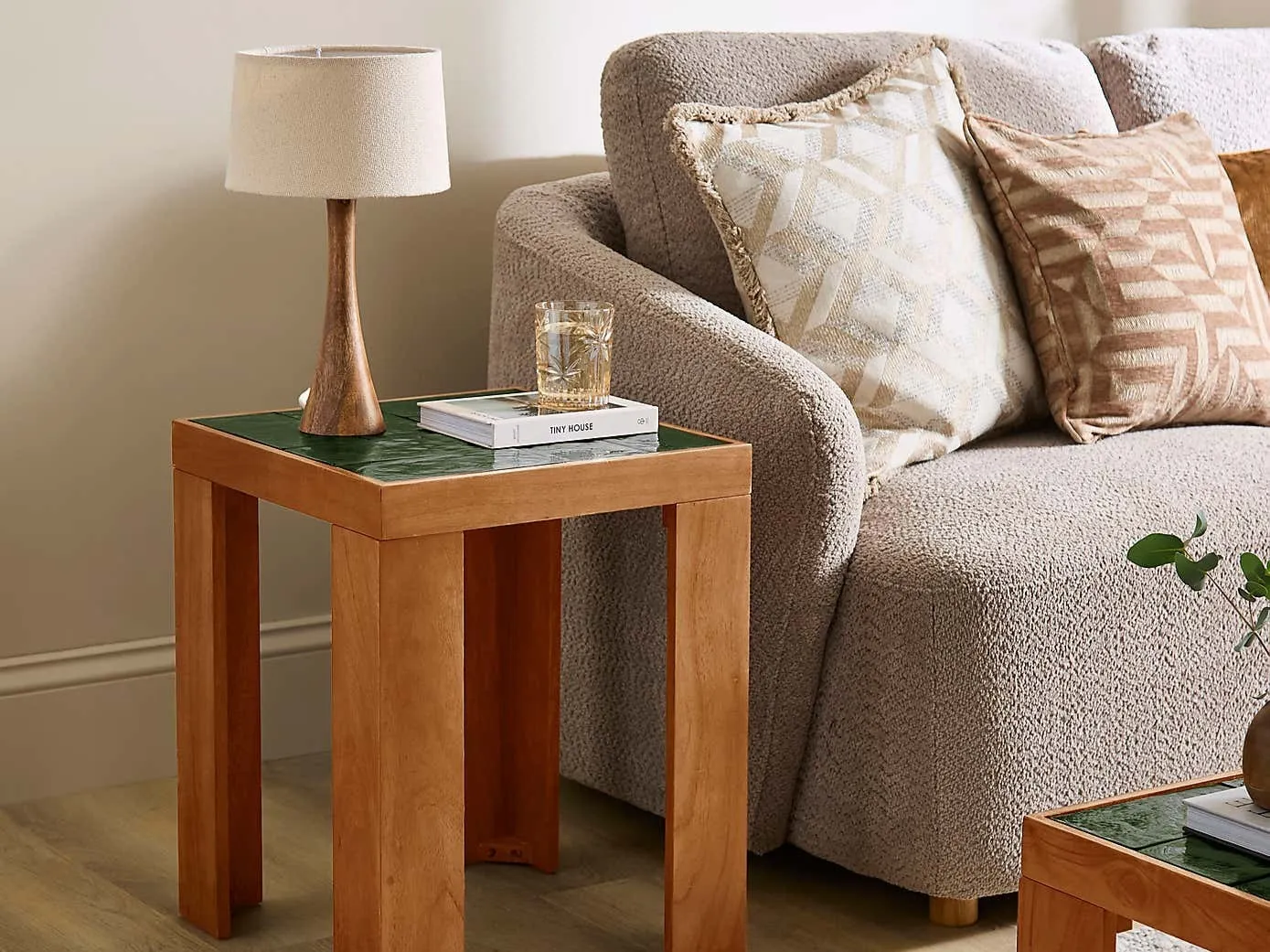 Side table with emerald glass top
