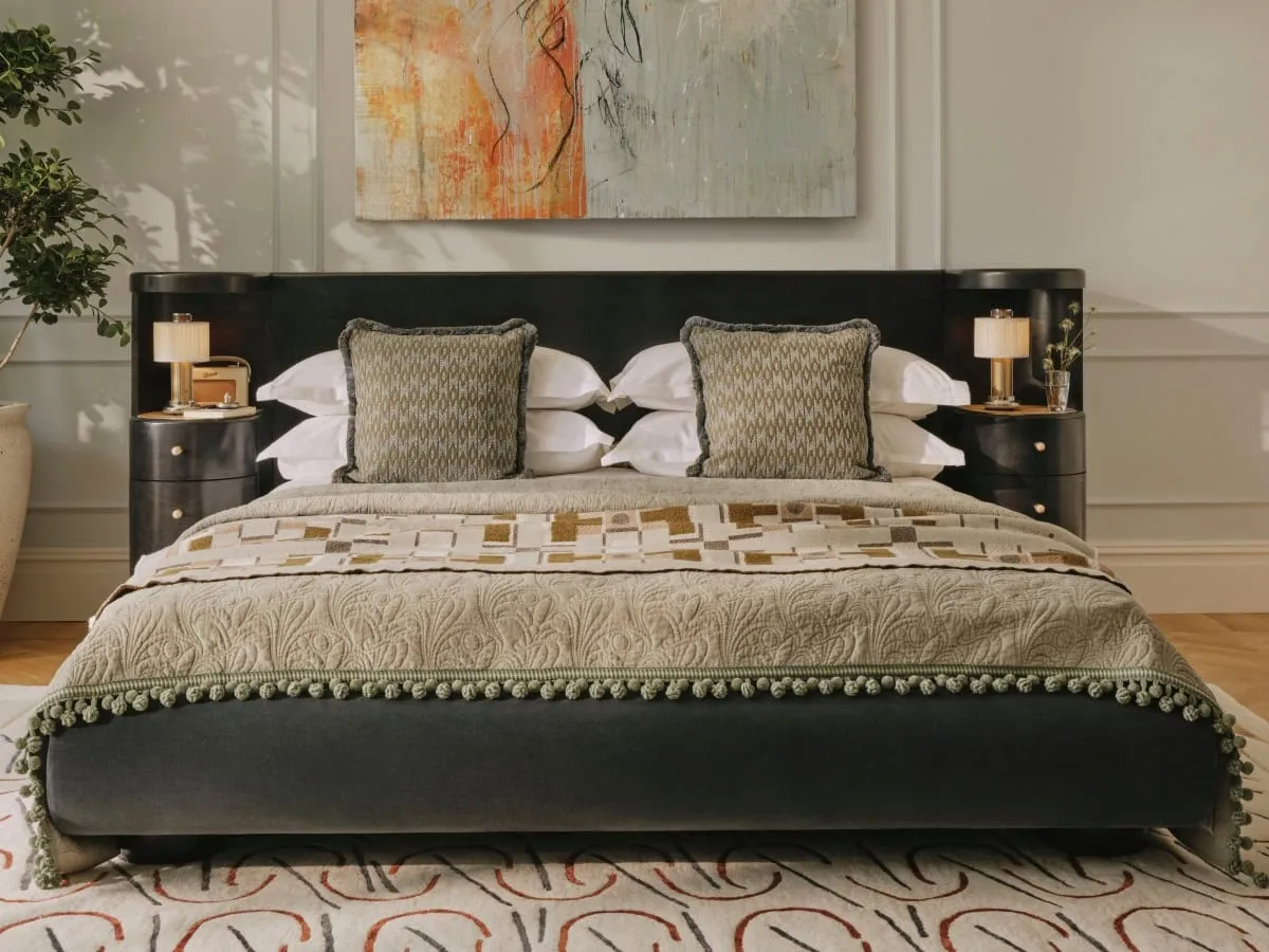 Velvet upholstered bed with over-size headboard