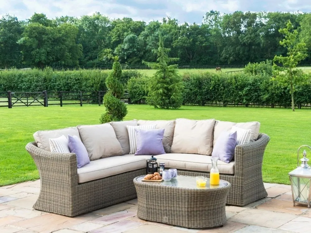 Rattan outdoor corner sofa and oval coffee table