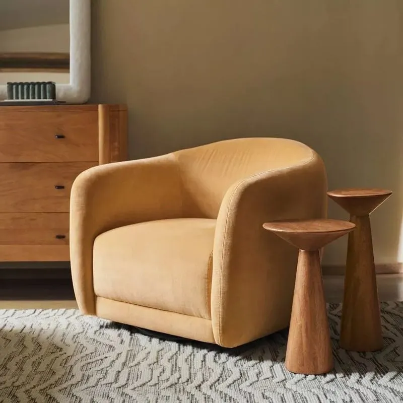 Pair of round walnut side tables