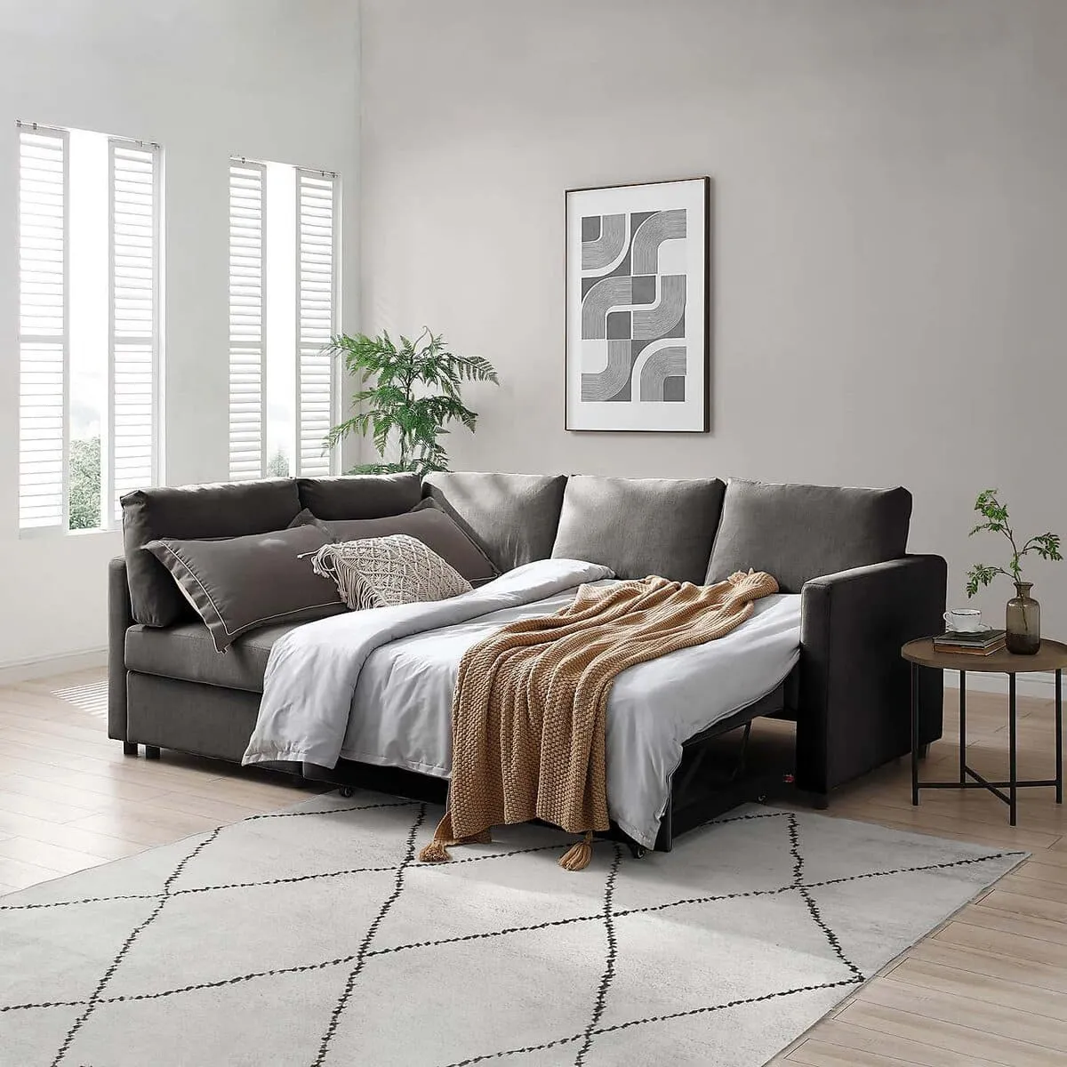 Grey fabric upholstered corner sofa bed