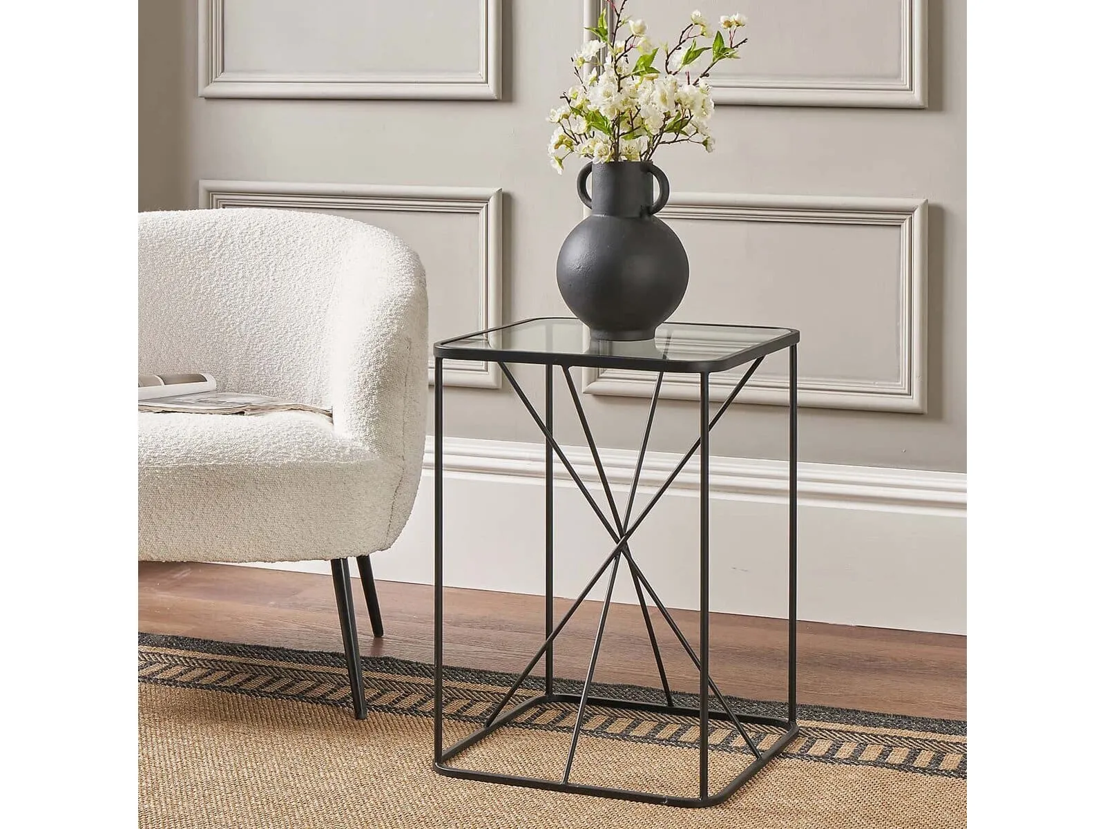 Square black metal side table with glass top