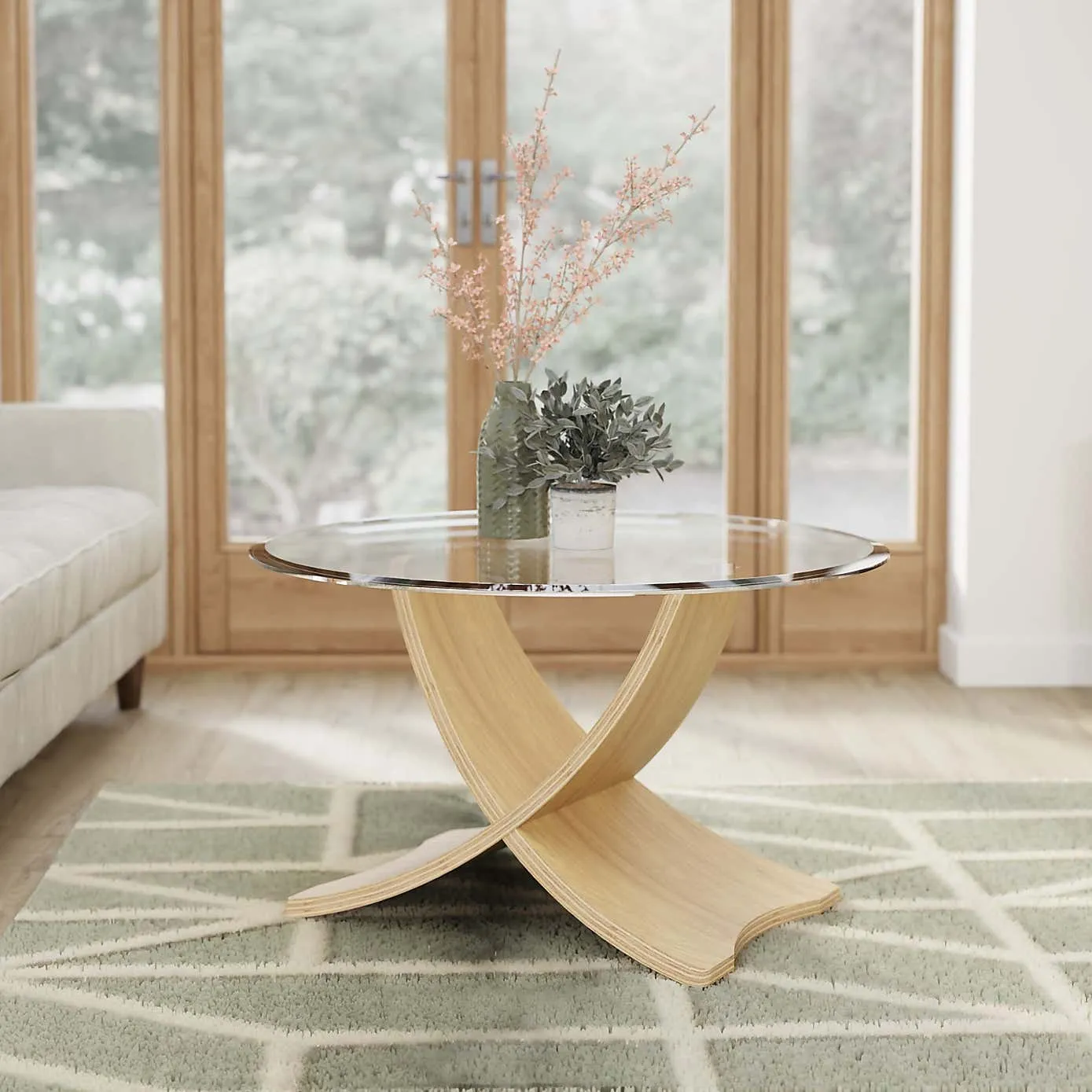 Round glass coffee table with curved oak finish frame