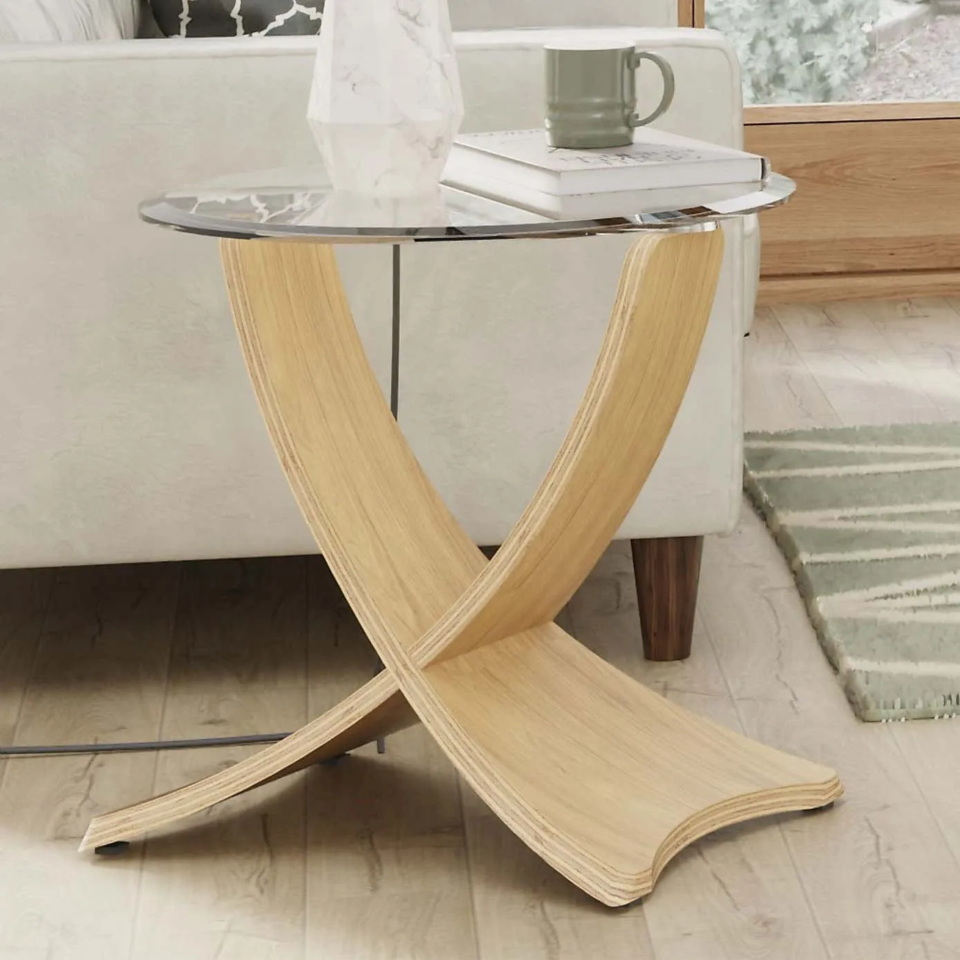 Round glass side table with curved oak finish frame