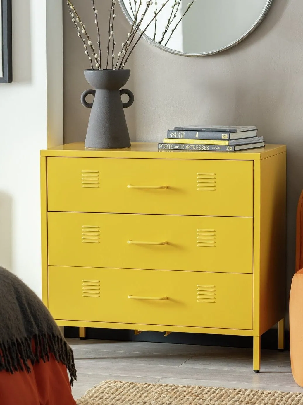 Yellow-painted metal drawer chest
