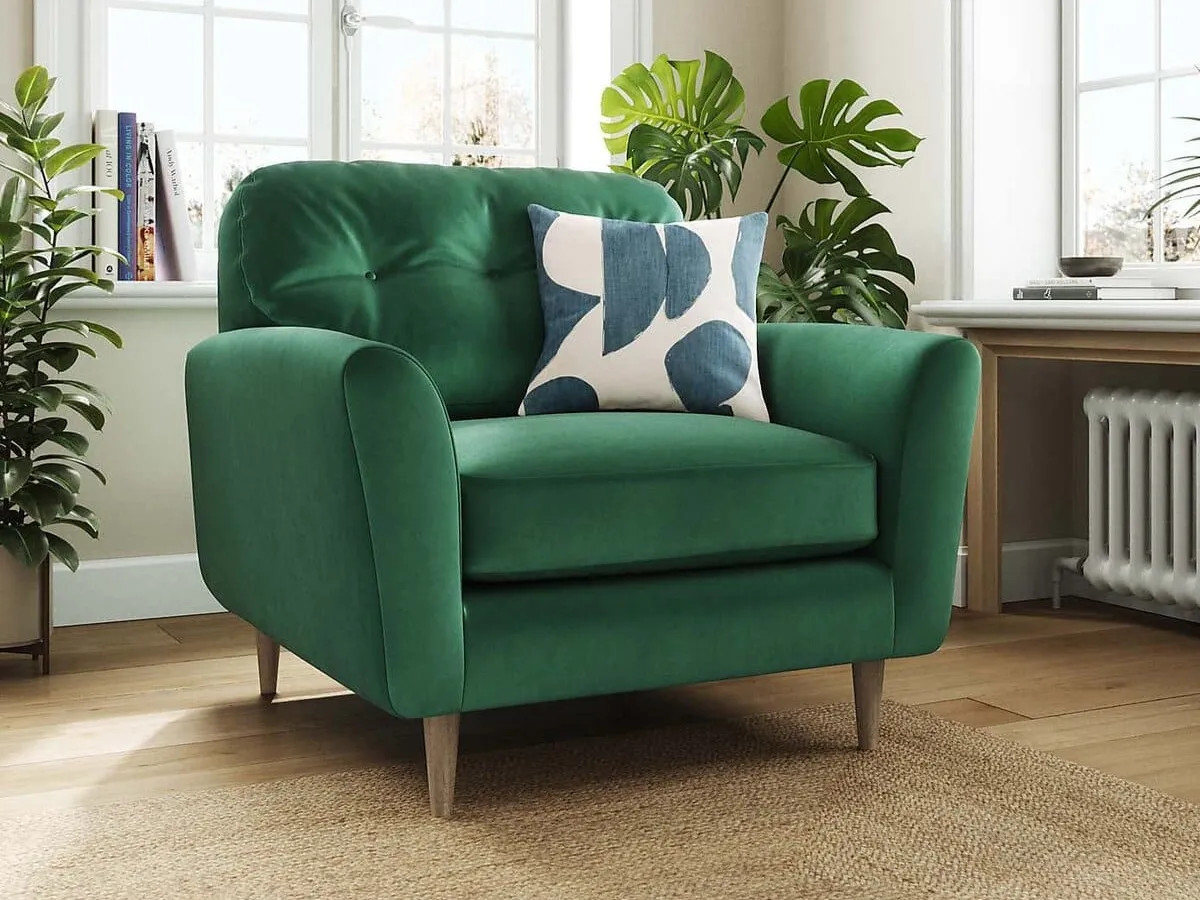 Green velvet upholstered armchair