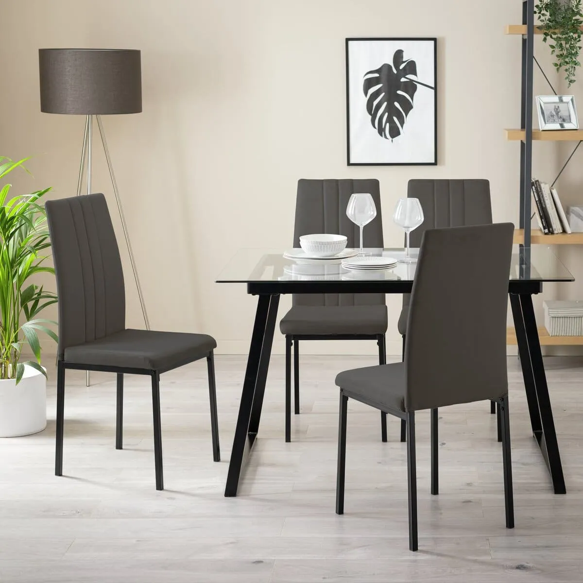 Black frame dining table with glass top and 4 charcoal velvet chairs