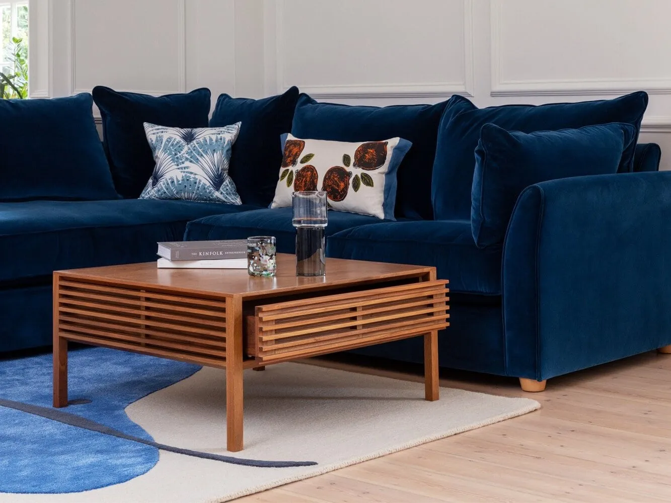 Walnut storage coffee table with slatted drawer