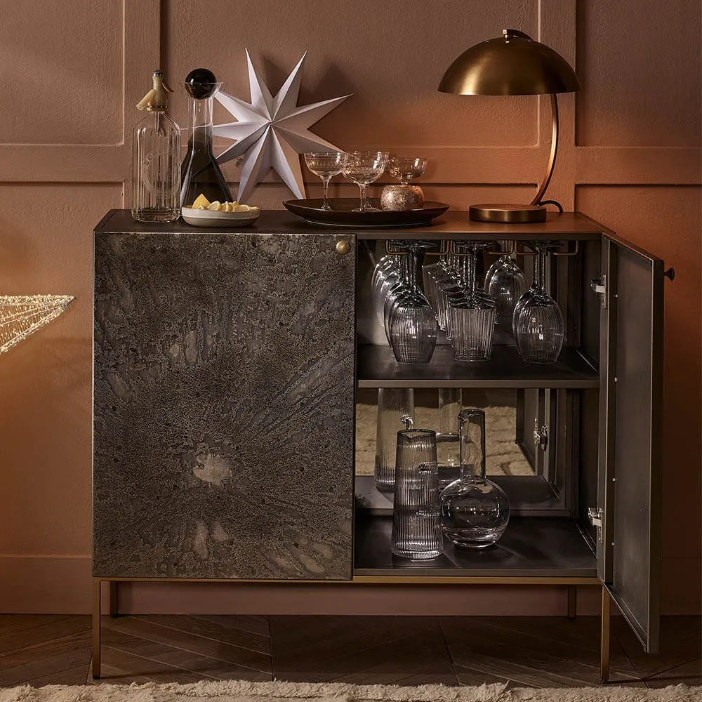 Drinks cabinet with oxidized iron doors