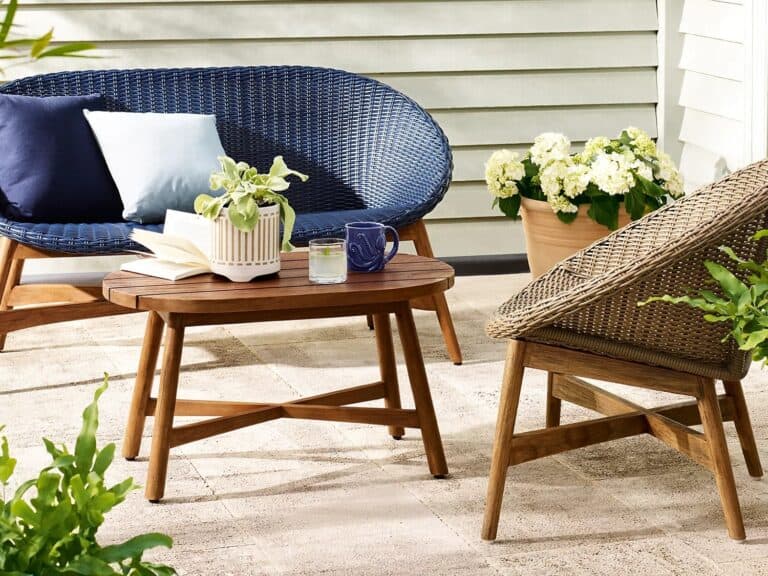 Woven rattan armchair, sofa and wooden coffee table