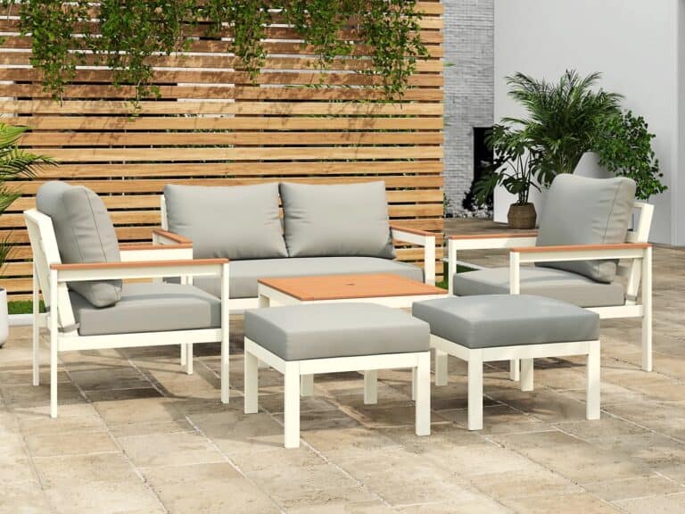 White and grey outdoor sofa, chairs, stools and a coffee table