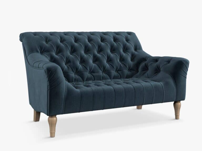 Blue fabric upholstered button back sofa