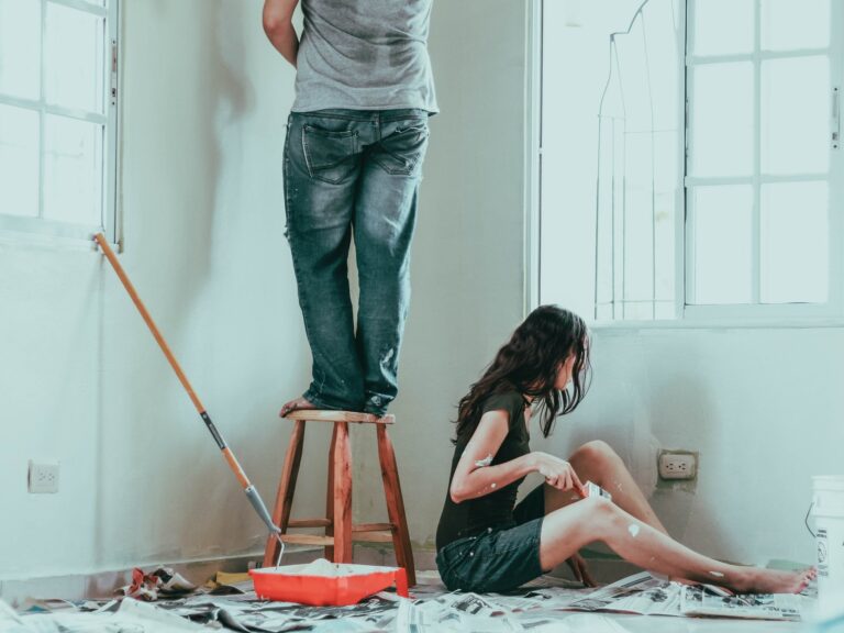 Couple decorating their home