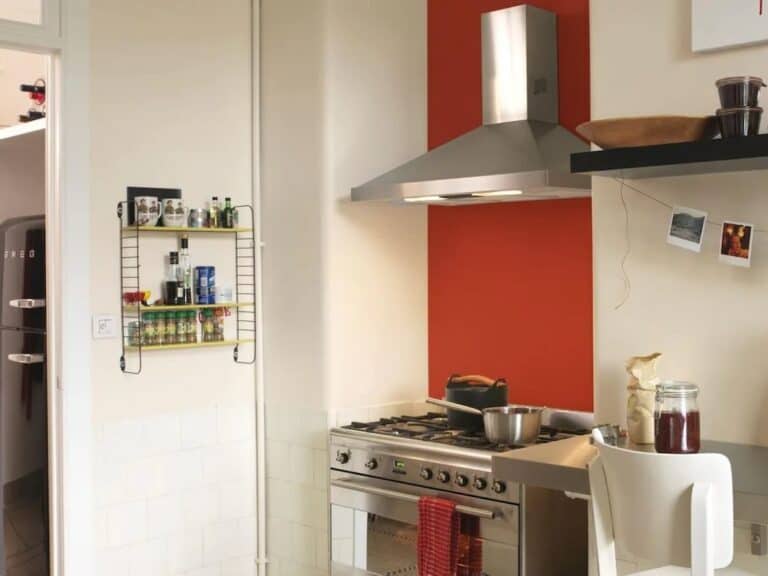 A kitchen transformed with a dark red accent colour